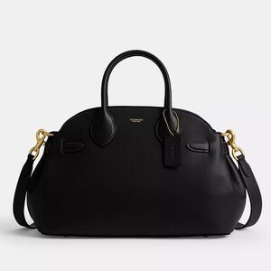 Coach Black Leather Empire 35 with strap.